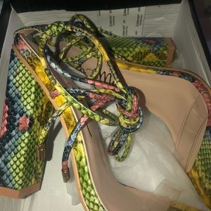 Snake print lace up heels Never worn!
